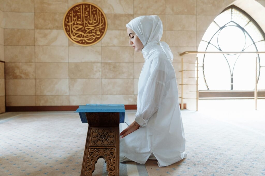 A Woman Kneeling on the Floor